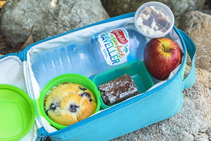 Morning tea includes: Blueberry muffin, chocolate brownie, mixed dried fruit and nuts, apple, bottle of water, tea and coffee.